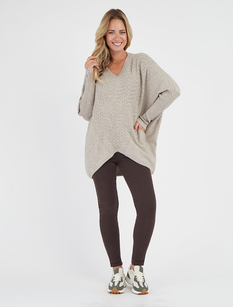 Asymmetrischer Poncho mit langen Ärmeln und Taschen - Maulwurf