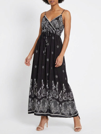 Langes Kleid mit arabesken Blumenmuster - Schwarz