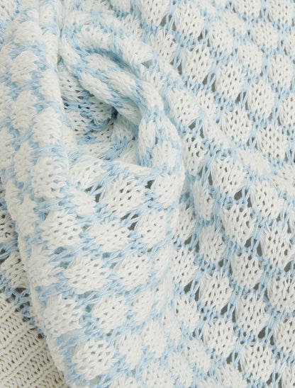 Pull sans manches motif nid d&