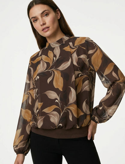 Bluse mit Blattdruck und elastischen Manschetten. - Braun